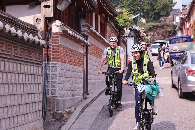 Afternoon E-bike tour and "Happy Hour" food and drinks - Cheonggyecheon Stream and the Story Behind a Divided Korea