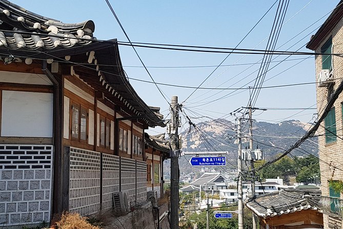 Best Walking Tour to Gyeongbok Palace Bukchon Hanok Village - Starting near Gwanghwamun and King Sejong