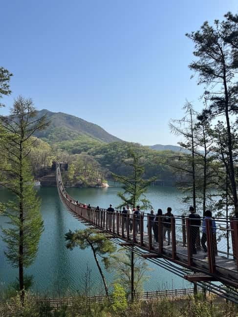 DMZ; NK Defector, 3rd Tunnel, Suspension Bridge,Hotel pickup - Unification Village and the working border