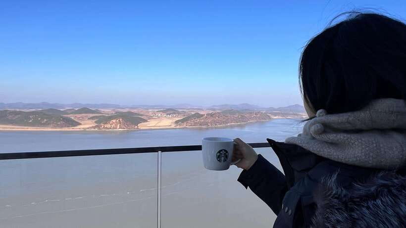 From Seoul: Aegibong Starbucks Observatory & DMZ View - Crossing the 112-meter suspension bridge
