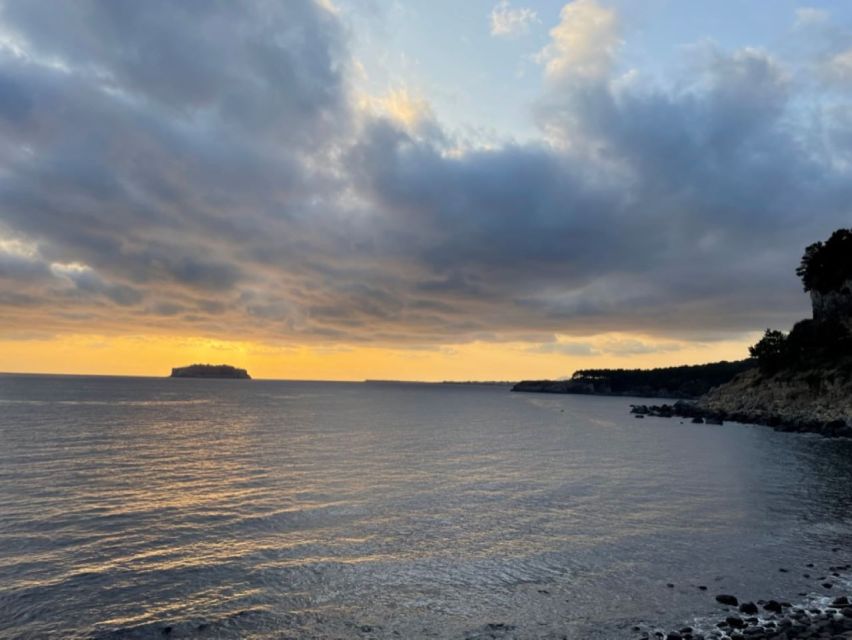 Jeju: Seogwipo City Walking Tours with Sunset - Walking Saeseom Island in 30 minutes