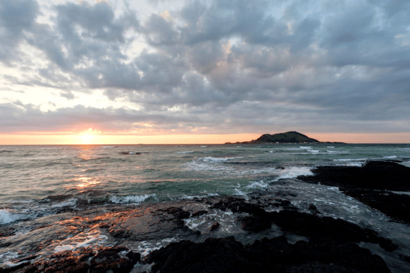 Jeju: Sunset Tour Olle Trail Walking Tour with Hotel Pickup - Leaving Jeju City in the late afternoon