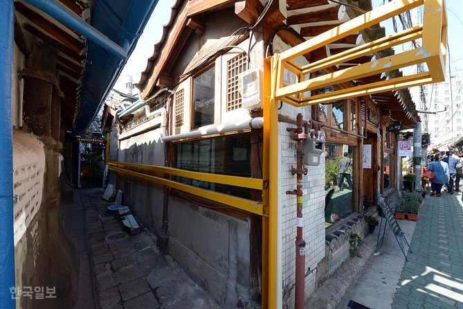 Korean History & Heritage Tour - Kwangjang Market and a quick taste of Seoul