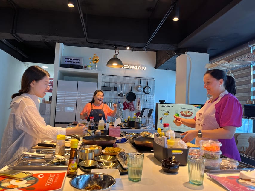 Seoul: Korean Cooking at Seoul Cooking Club! - Japchae, bulgogi, and bibimbap share the main course