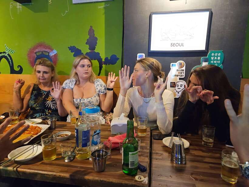 Seoul: Korean Drinking Games Night (non-drinkers welcome) - Learning Somaek and the Soju Bomb