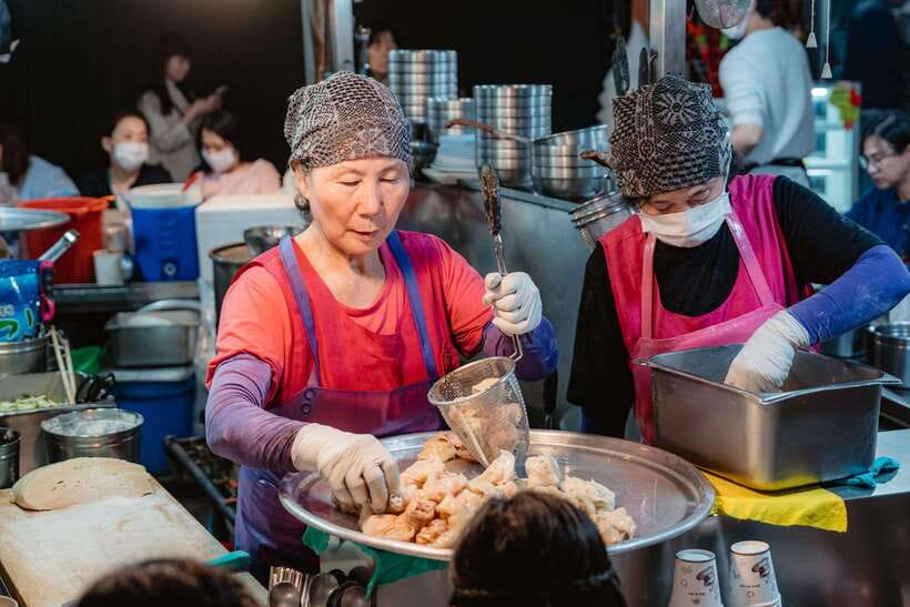 Seoul: Night Market Food Tour with Local Guide - The bigger meal: noodles, beef, and banchan