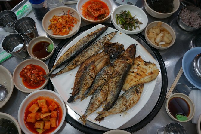 Seoul Night "Private Tour"(Korean BBQ, N-Tower, Seoul Fortress, Local Market) - Cheonggyecheon Stream for a calmer final walk