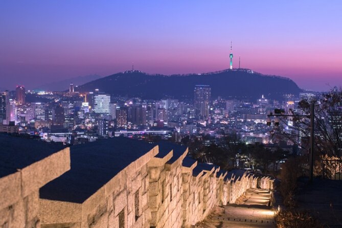 Seoul Night Tour (Gwangjang Market, Royal Palace and Naksan Park) - Cheonggyecheon Stream in the city center